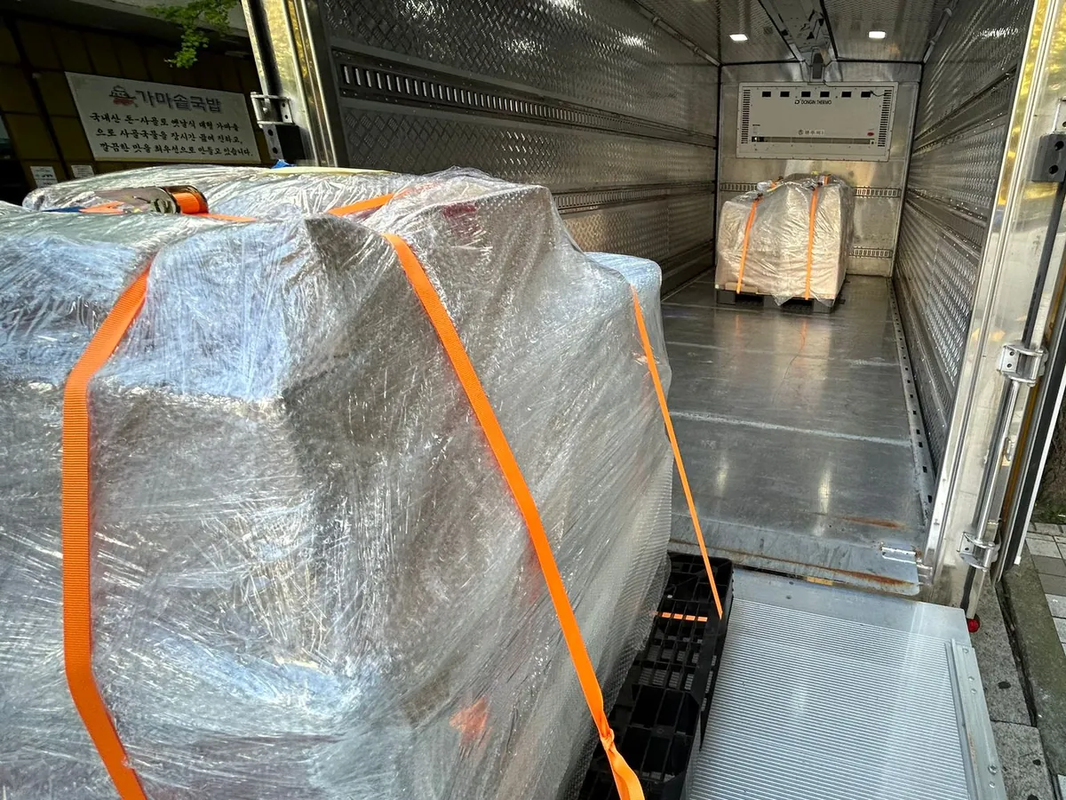 A pallet on a truck's tail lift, as shot